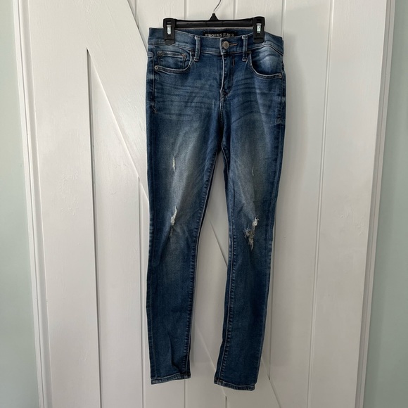 Express size 4 ultimate stretch legging jeans mid rise